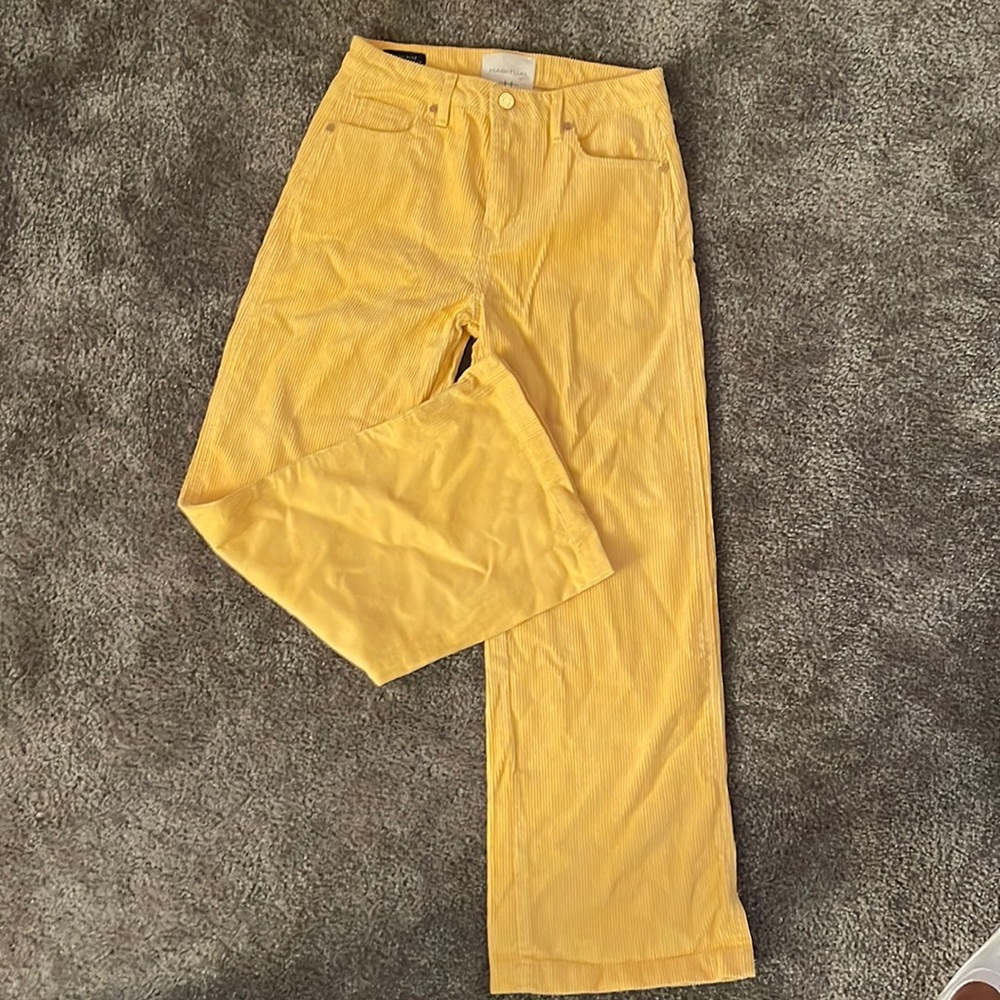 Girls yellow cords. New without tags - never worn or tried on. Perfect condition